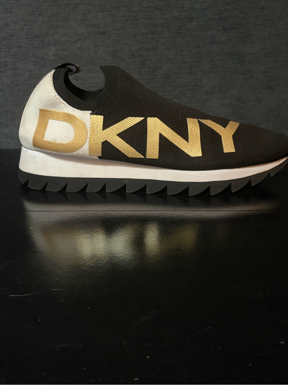 DKNY Black White Slip-On Sneaker with Gold Logo and Adidas sneakers. Lot of 2